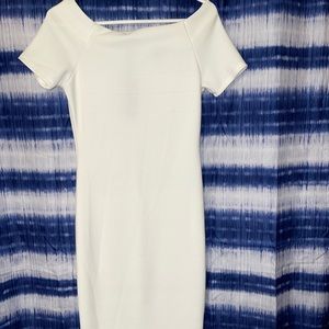 Cute medium white dress. Between knees. Never worn. Brand NEW.